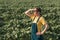 Sunflower farmer posing in field