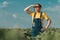 Sunflower farmer posing in field