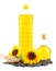 Sunflower oil in plastic bottle, seeds and flower isolated on white background