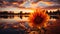 Sunflower in sunset, vibrant beauty reflects on tranquil water generated by AI