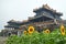 Sunflowers in front of the entrence door from the imperial city, Hue, Vietnam. On a foggy day.