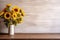 Sunflowers in a vase on a wooden background, a radiant composition with text space