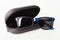 Sunglasses with black open protective case isolated