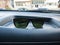 Sunglasses on a dashboard of a car