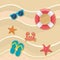 Sunglasses with float and starfishes with flip-flop and crab in the beach sand