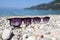 Sunglasses near sea, beach