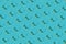 Sunglasses pattern on turquoise blue background with hard shadow