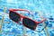 Sunglasses poolside in summer