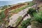 The sunk asphalt road after a landslide.