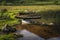 Sunken paddle boats in Lough Gummeenduff in beautiful Black Valley at sunset