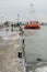 Sunken pleasure boat at the pier in Bulgarian Pomorie