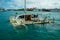 Sunken sailboat in Galapagos in a beautiful blue water