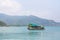 Sunken ship near pier of Bang Bao fishing village, which consists of houses on stilts built into the sea.