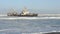 Sunken ship in the ocean breakers grounded at Namibia coastline