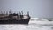 Sunken trawler, shipwreck. Old rusty metal ship Zeila at Skeleton Coast Namibia.