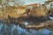 Sunken under water fence garden. Flooded during the spring flood of the Hoper River suburban houses