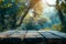 Sunlight filters through leaves onto a rustic wooden table top.