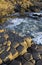 Sunlight highlighting the hexagonal Basalt slabs of Giants Causeway