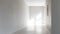 Sunlight illuminates a white hallway with framed artwork on the wall. AI Generated