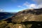 Sunlight on long ridge of Lad Hows