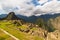 Sunlight at Machu Picchu, Peru, with scenic sky