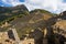 Sunlight on Machu Picchu terraces from below, Peru