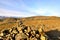 Sunlight on the marker cairn of Dove Crag