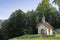 Sunlight morning view of tourist attraction small chapel