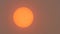 Sunlight obscured by Sahara dust and wildfire smoke