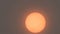 Sunlight obscured by Sahara dust and wildfire smoke