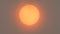 Sunlight obscured by Sahara dust and wildfire smoke