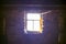 Sunlight in old wooden window