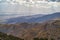 Sunlight over Palm Springs and Bermuda Sand Dunes from Joshua Tree National Park