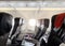 Sunlight rays entering through the porthole of a commercial airliner. Interior of an airplane passenger cabin with empty seats