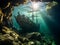 the sunlight shines brightly over an underwater ship in the rocks