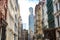 Sunlight shines on the buildings along Greene Street in New York City