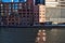 Sunlight shining through building windows reflects pattern onto the Chicago River in the Loop.