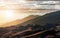 Sunlight shining over Great Sand Dunes National Park in the Colorado Rocky Mountains