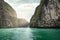 Sunlight shining on Pileh Lagoon limestone mountain on andaman sea at Phi Phi Island