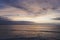 Sunlight sunset on horizon ocean on background seascape atmosphere rays sunrise. Relax view waves sea on evening sand beach, sun l