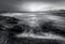 Sunlight and surf over coastal rocks, Constantine Bay, Cornwall