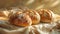 Sunlit Artisan Bread: Round Loaves with Flour Dusting on Linen Cloth