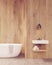 Sunlit bathroom with wood walls