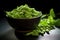 sunlit bowl of edamame beans against dark background