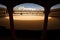 Sunlit circle inside empty bull fight arena