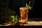 sunlit glass of ice tea with mint leaves and straw