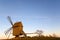 Sunlit old traditional windmill