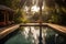 sunlit pool in a backyard of a rental villa