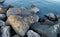 Sunlit rocks and calm blue Adriatic sea