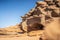 Sunlit sandstone rock formation in the Atlantic coast near Agadir, Morocco